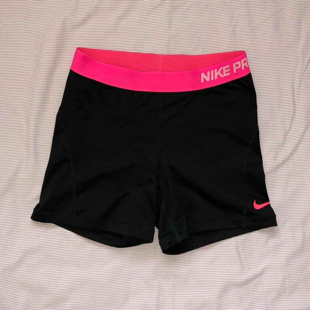 nike pro shorts with pink waistband and swoosh